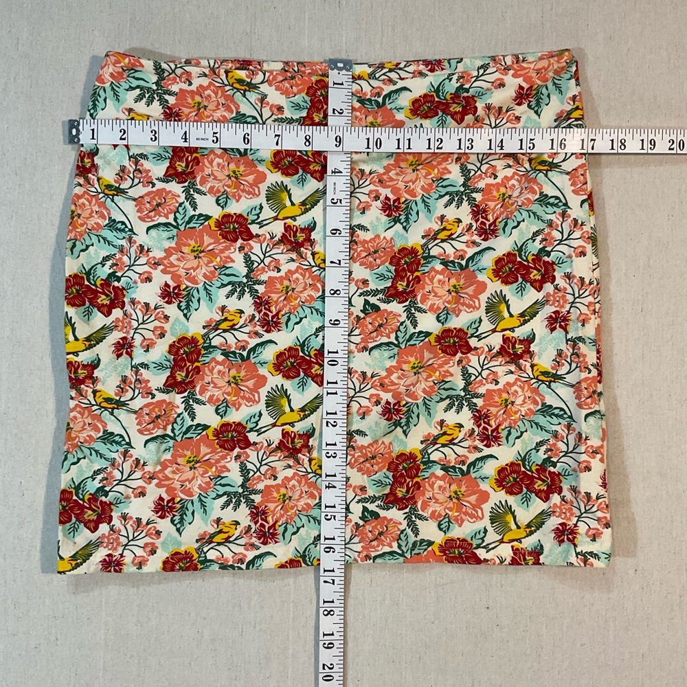 - Mini Skirt with colours of red, yellow and orange,  stretchy large,A+